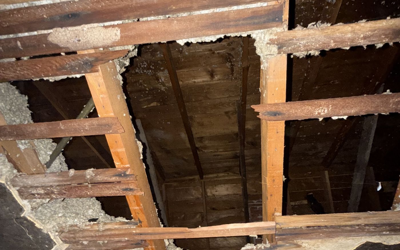 Fire damage above the ceiling line, opened up for inspection